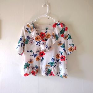 Slightly cropped floral blouse size M